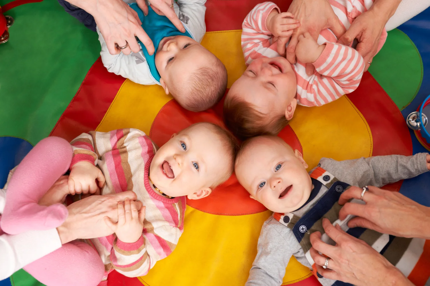 Babies on a playmat