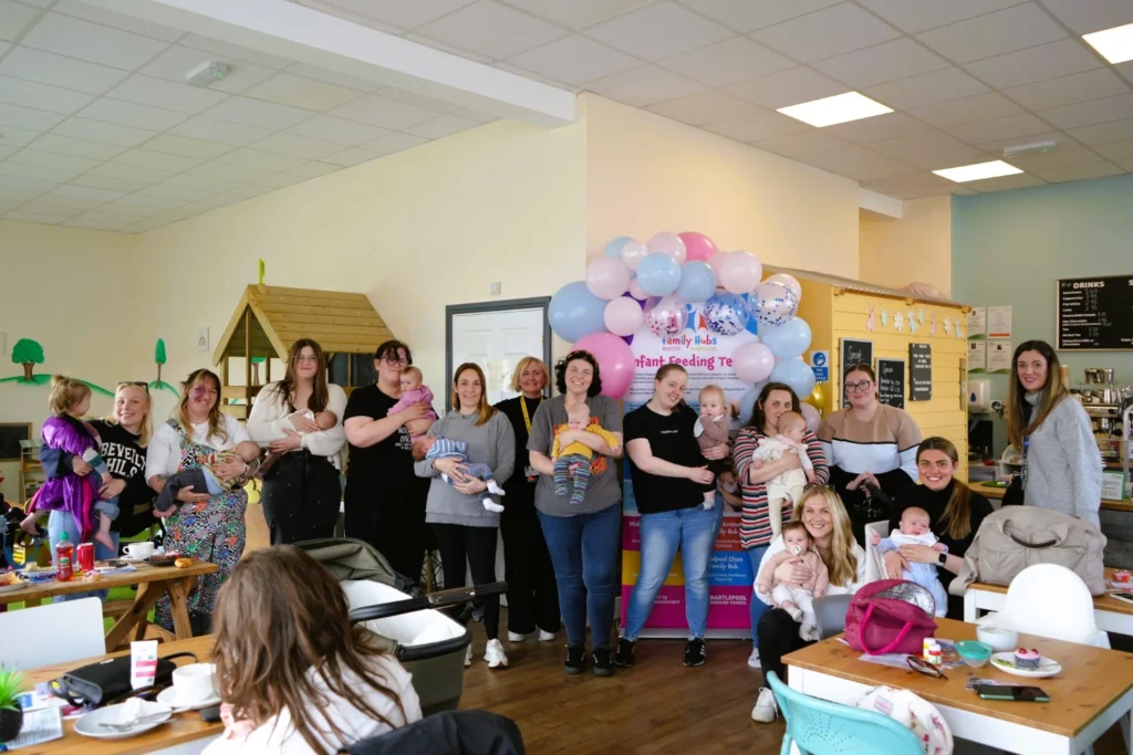 Group of woman and babies at local feeding group