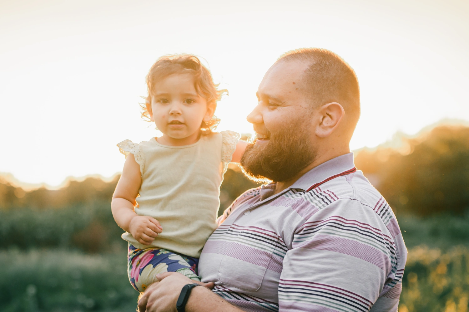 Man holding a young child